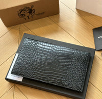 YSL uptown pouch in crocodile-embossed shiny leather