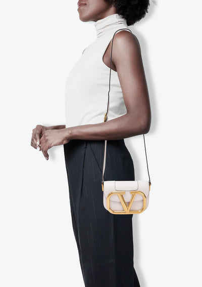 Valentino Garavani – Leather Small Supervee Crossbody Bag hover